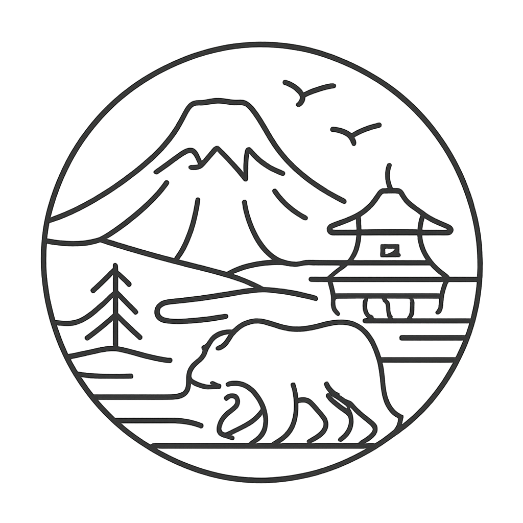 A bear in the mountains with a cabin in the background.